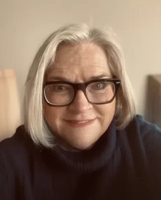 Julia Hopkins - counsellor in Hand outstretched to light - counsellor in Penarth, Vale of Glamorgan